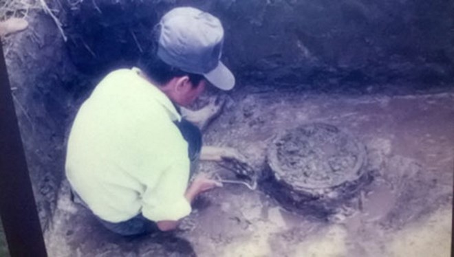 Việt Nam phát hiện kiểu mộ táng chum gỗ trống đồng cách đây 2.000 năm